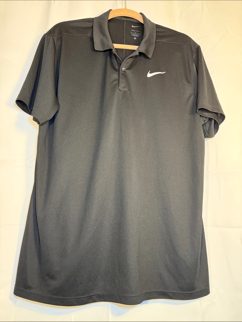 Nike Black Polo Shirt with White Swoosh